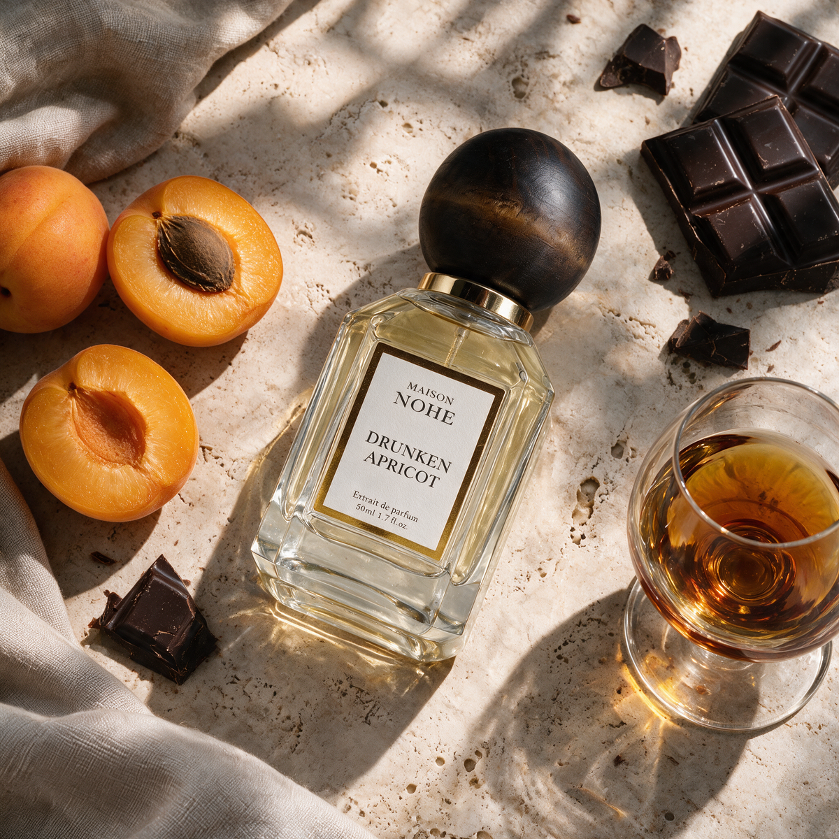 Drunken Apricot, Maison Nohe, entouré de ses notes : abricot, chocolat, cognac
